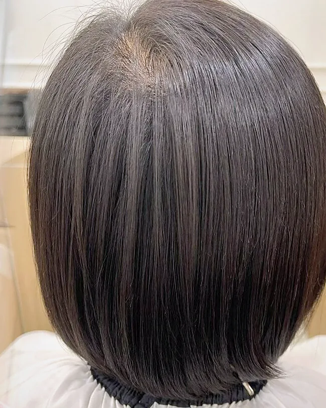The same bob after treatment, smooth with a glossy finish