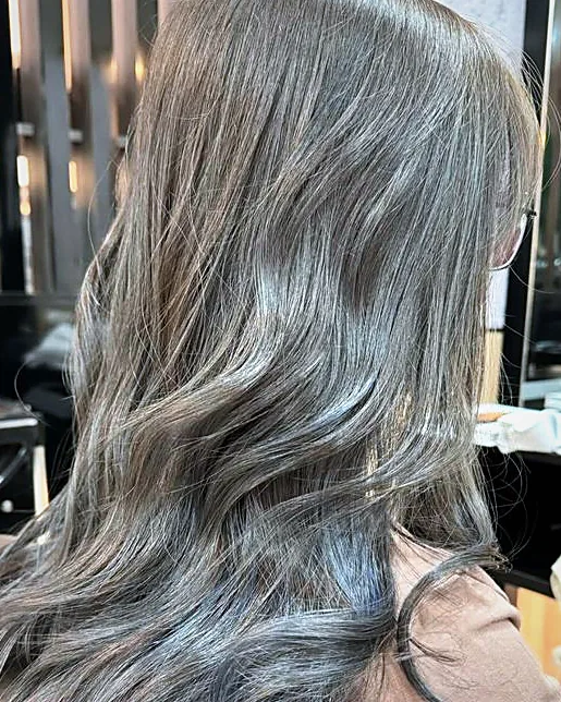 Ash brown balayage with a soft grown-out root
